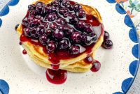 Golden Griddle Buttermilk Pancakes with Bursting Blueberry Sauce