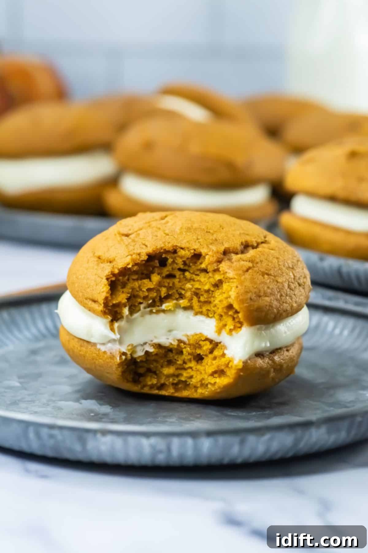 Fluffy Pumpkin Whoopie Pies with Cream Cheese Frosting 1 featured 94326 1