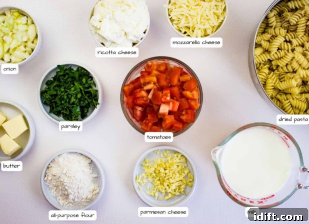 Bowls of diced onion, parsley, butter, all-purpose flour, ricotta cheese, mozzarella cheese, tomatoes, parmesan cheese, dried pasta, and a measuring cup of milk, labeled.