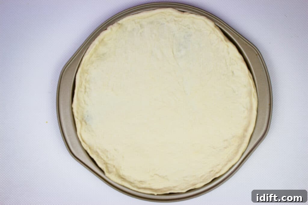 Lemon-Garlic Shrimp Pizza 8 Easy pizza dough stretched out on pizza pans, par-baked and ready for toppings.