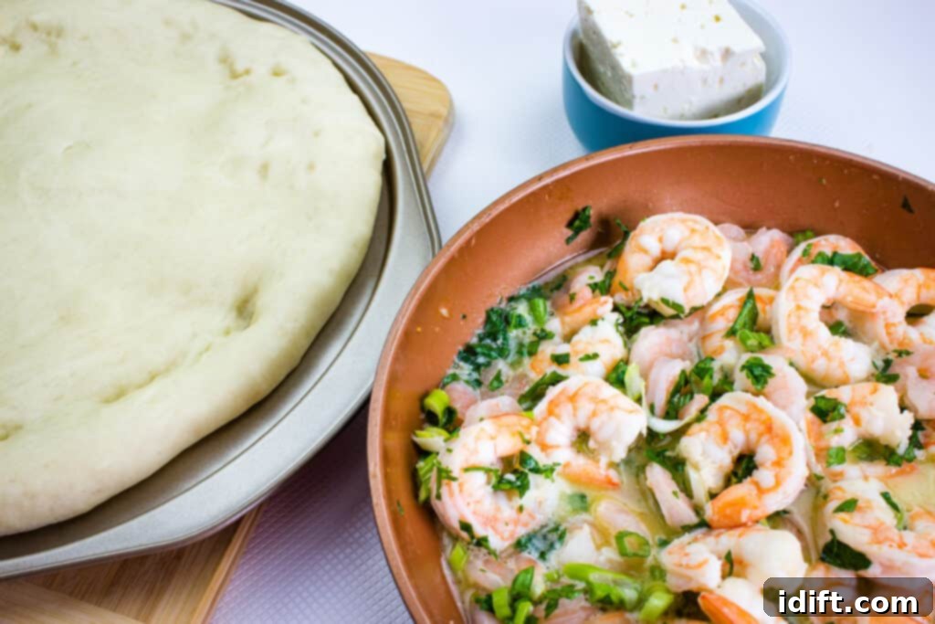 Lemon-Garlic Shrimp Pizza 9 Shrimp scampi mixture and cheeses topping a par-baked pizza crust.