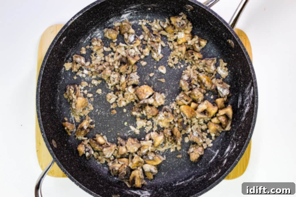 Savory Marsala Chicken Meatballs 12 Flour added to the skillet and whisked into the mushroom and shallot mixture, followed by chicken broth being poured in slowly.