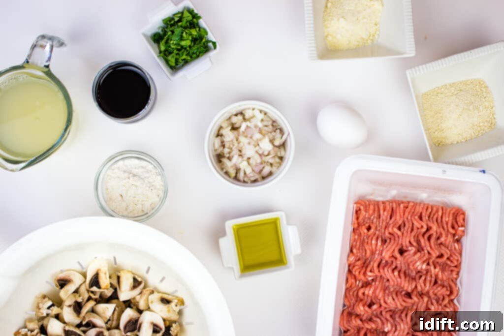 Savory Marsala Chicken Meatballs 6 Prepped ingredients to make Chicken Marsala Meatballs, including chopped parsley, minced garlic, and sliced mushrooms.