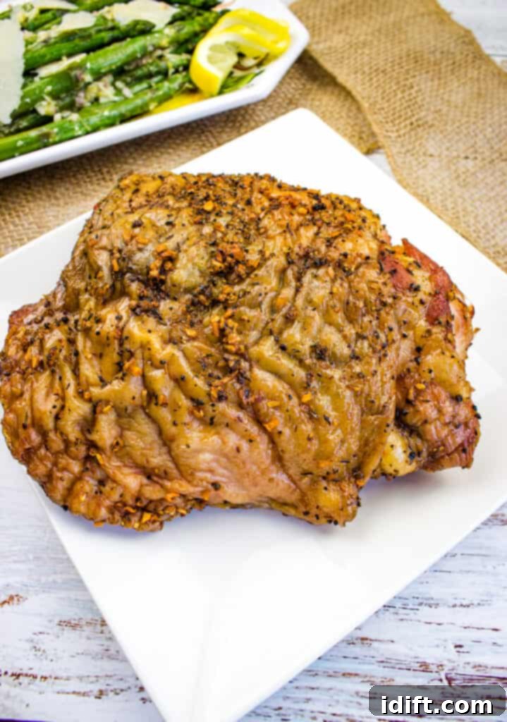 Smoked Turkey Thighs, tender and juicy on a rustic wooden board, ready to be served