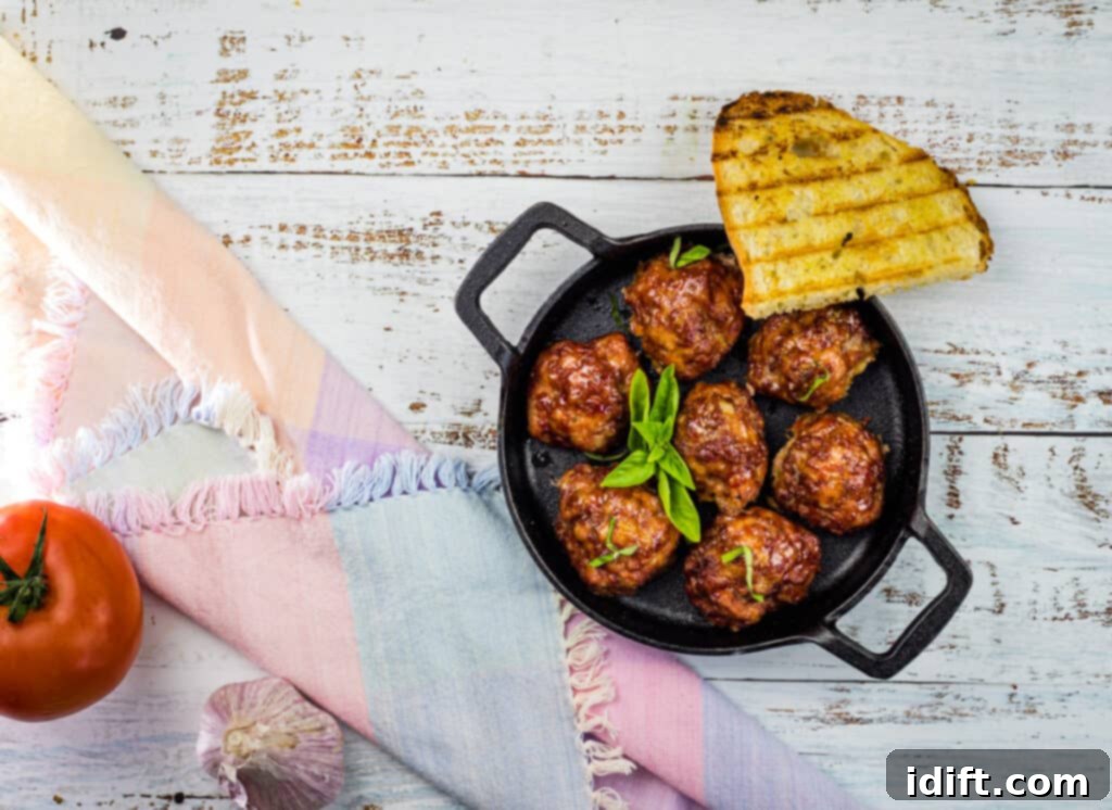 smoked meatballs in a dish with grilled bread