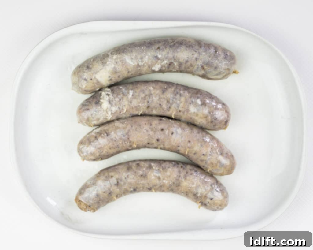 Perfect Sous Vide Sausages 8 cooked sous vide sausage removed from bag, pale but ready for searing