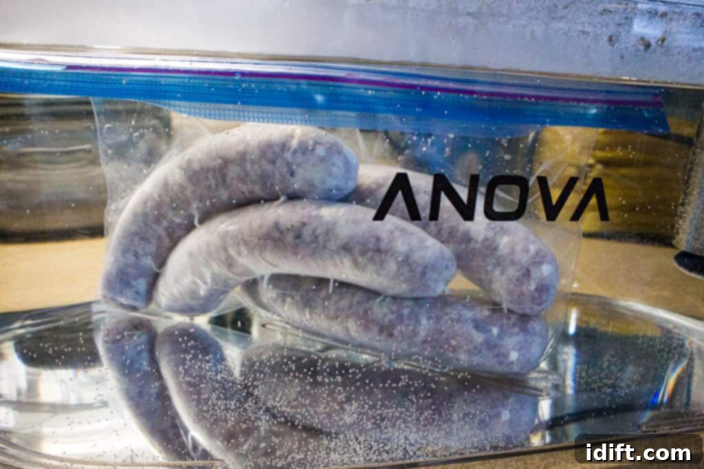 Perfect Sous Vide Sausages 7 sausages cooking submerged in a sous vide water bath