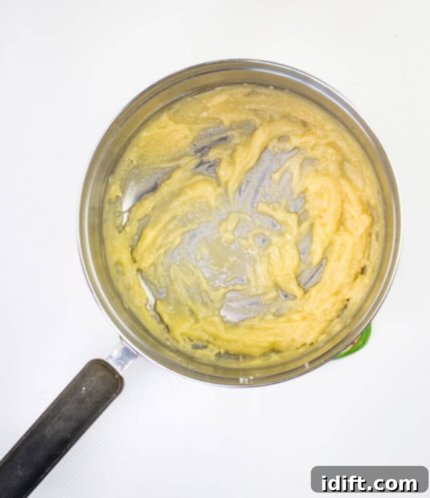 mixing butter and flour to make a roux