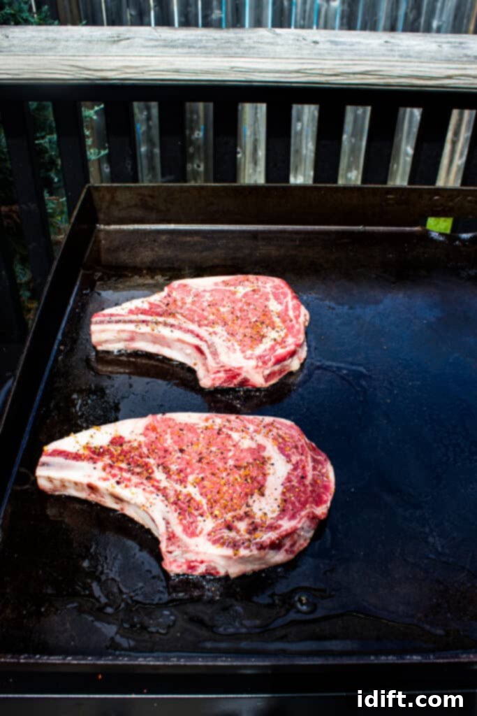 Blackstone Griddle Steaks: Sizzle to Perfection 5 steaks cooking on the blackstone