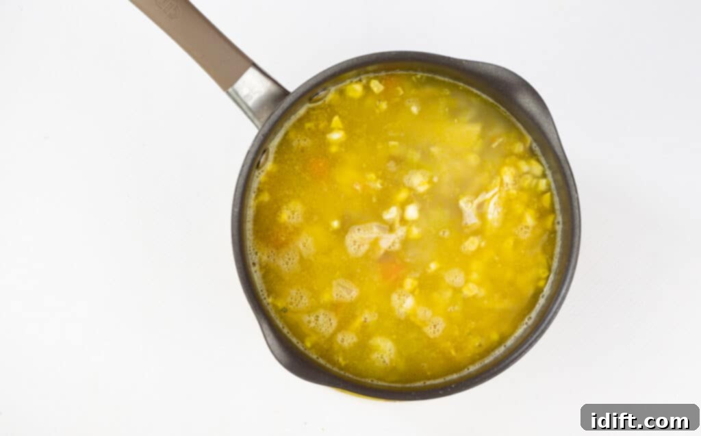 Hearty Chicken and Sweet Corn Chowder 9 add chicken and corn and continue to simmer.