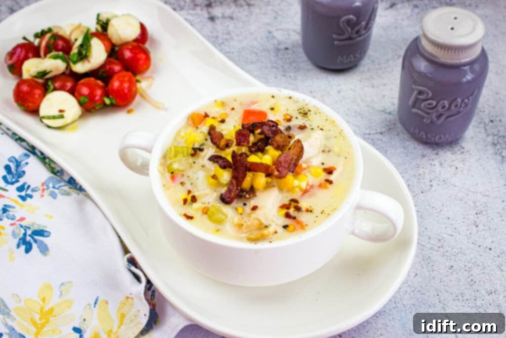 Hearty Chicken and Sweet Corn Chowder 3 corn and chicken chowder in a white bowl