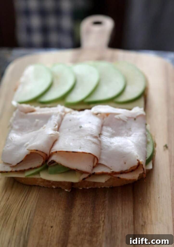 Pile on generous slices of turkey breast for a hearty filling.