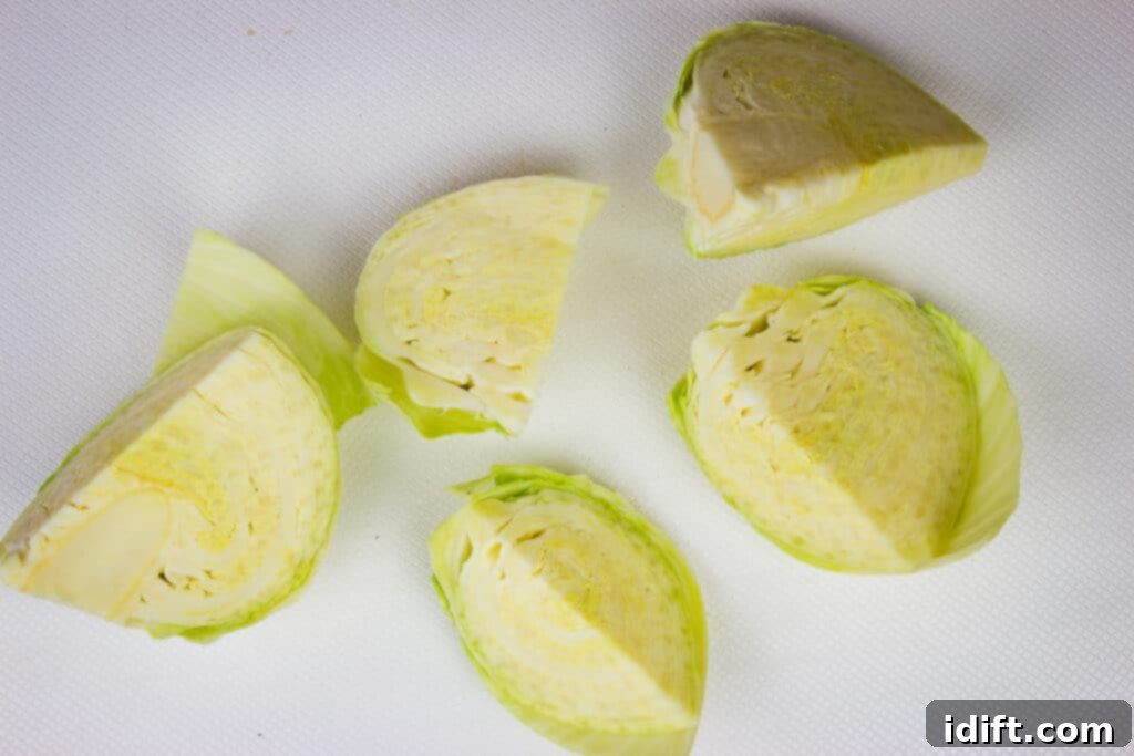 How to core cabbage and cut it into wedges for cooking.