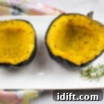 Golden Maple Acorn Squash 11 Maple Roasted Acorn Squash on a plate