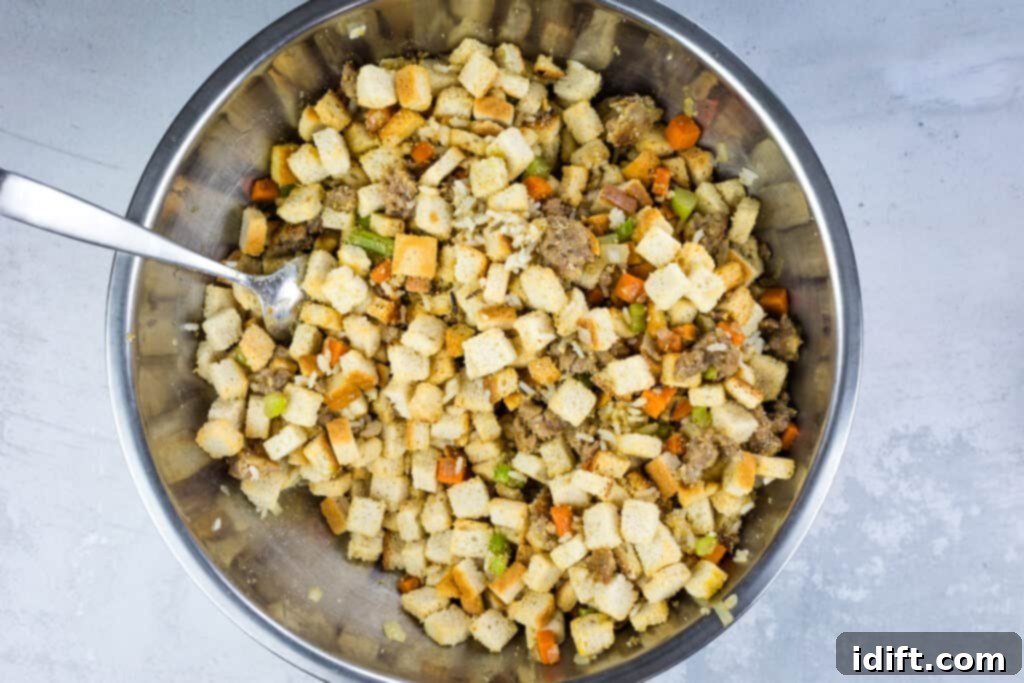 adding chicken broth to the sausage stuffing recipe