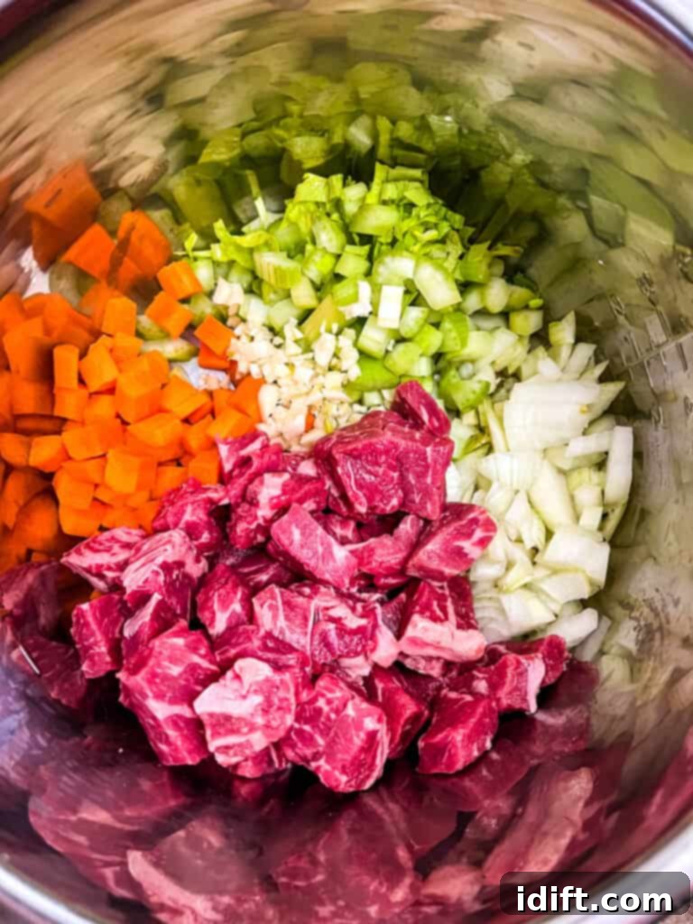 Hearty Instant Pot Steak and Potato Soup 5 steak and potato soup recipe sauteeing veg and beef