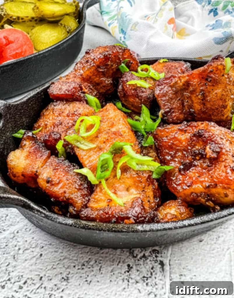 Pork Belly Burnt Ends - close up of delicious smoked meat cubes