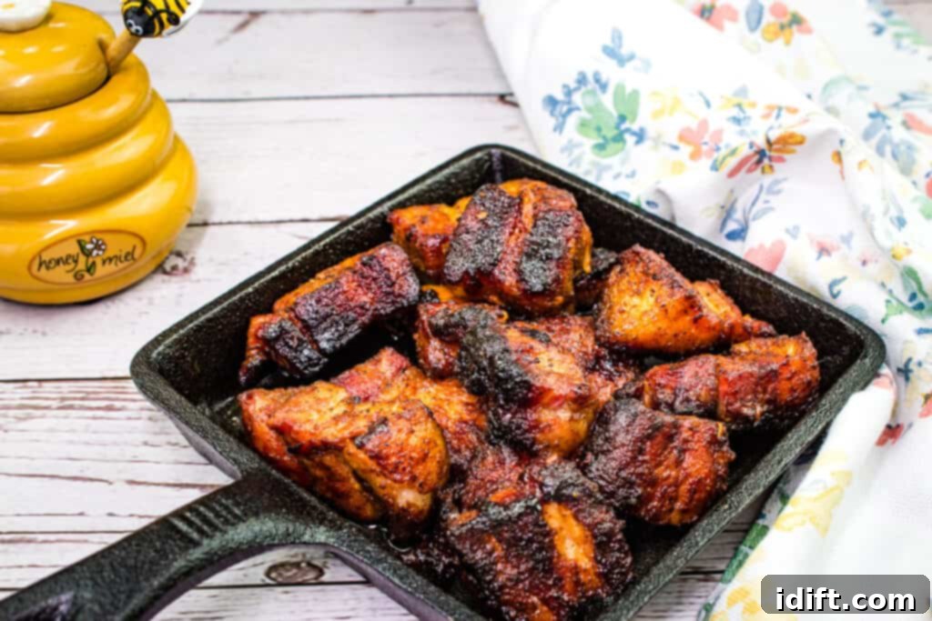 smoked pork belly burnt ends in a serving dish