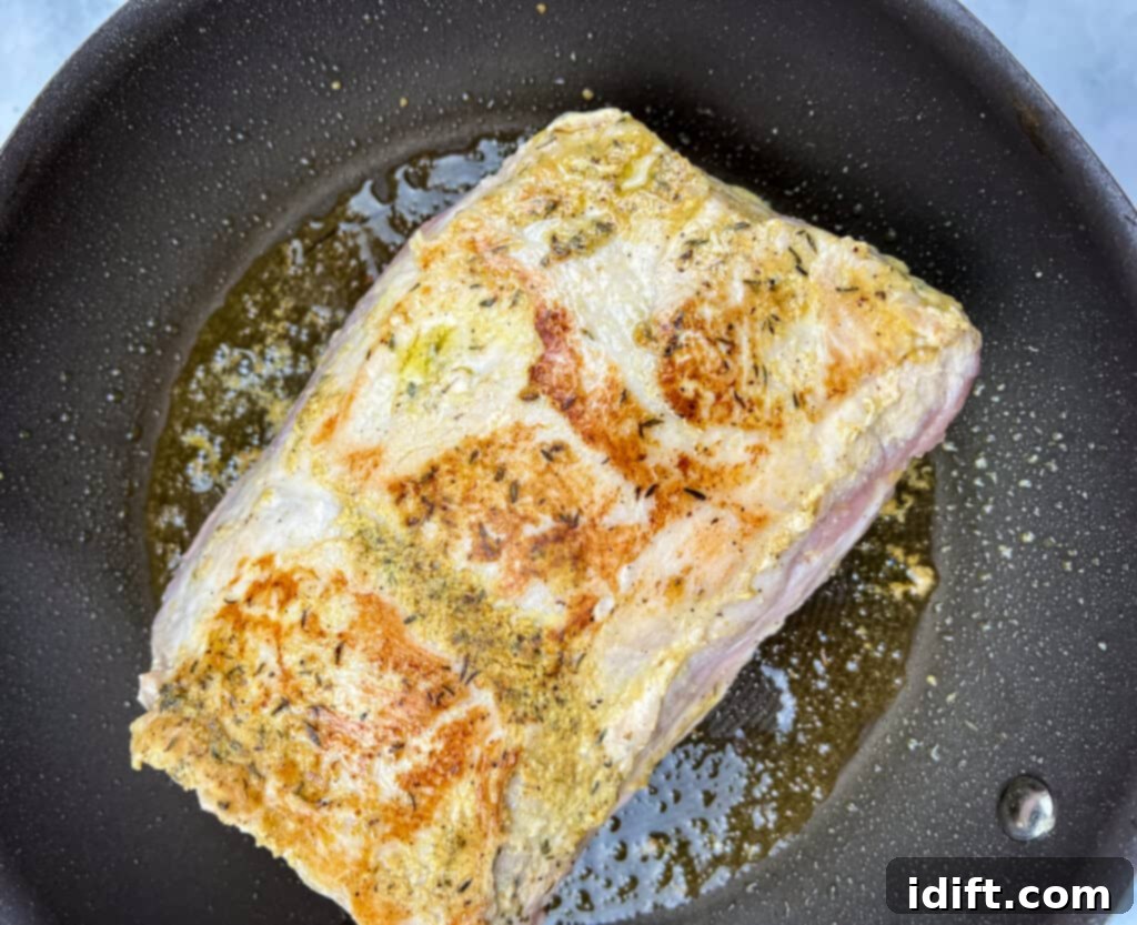 sear the pork in a skillet with oil to make german pork loin slow cooker