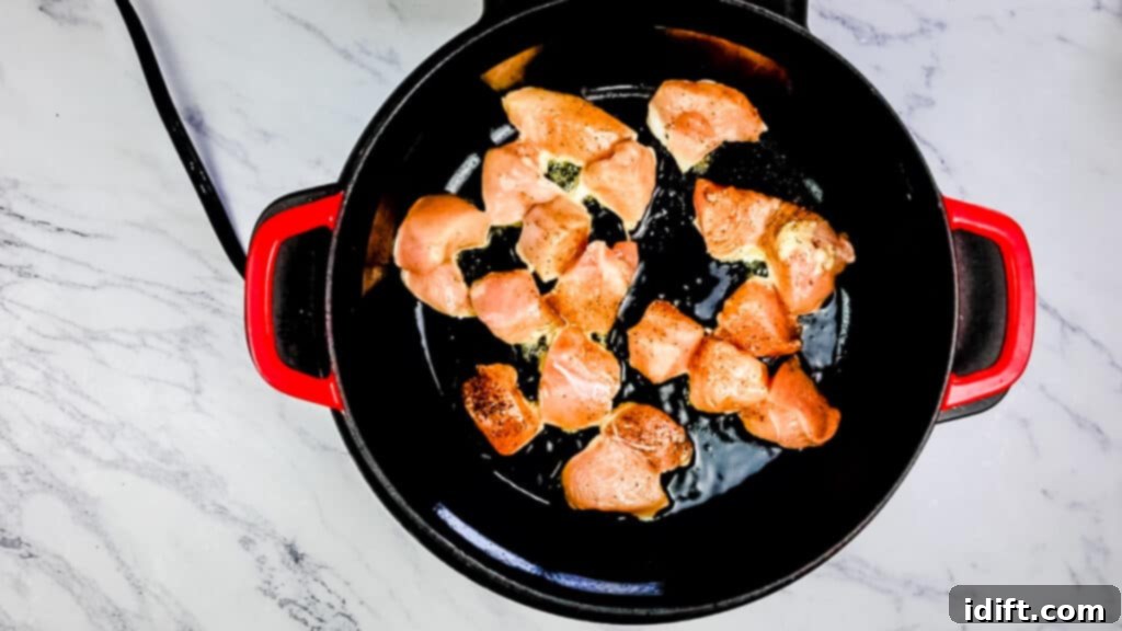 Browning chicken in the Instant pot dutch oven for chicken and cheddar dumplings