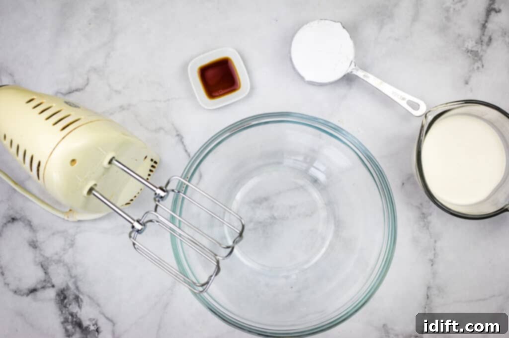 Ingredients for making homemade whipped cream icing.