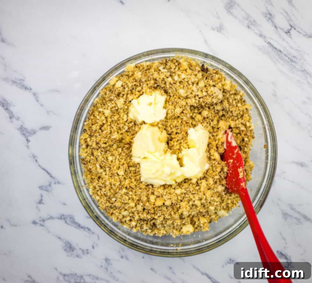 Decadent White Chocolate Bourbon Bites 8 Mix the butter into the dough.