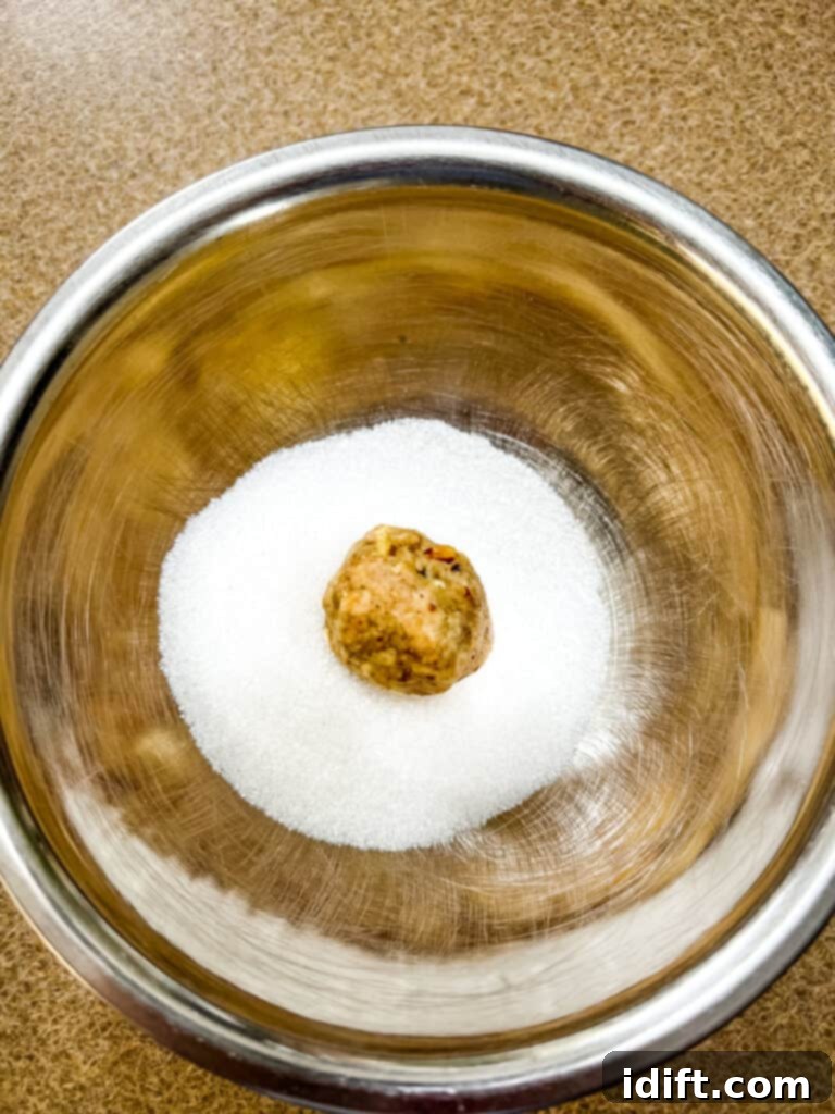 Decadent White Chocolate Bourbon Bites 10 Roll the balls then roll them in the sugar.