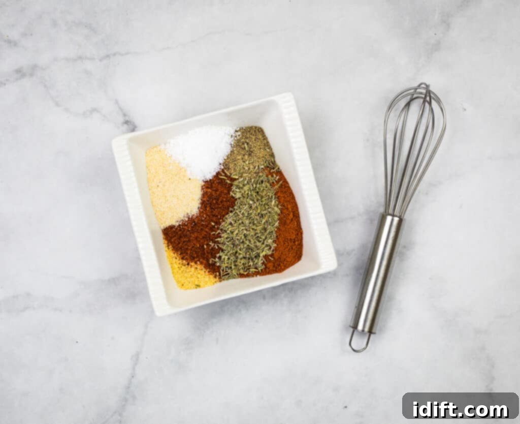 All the spices for the best pork rub combined in a mixing bowl