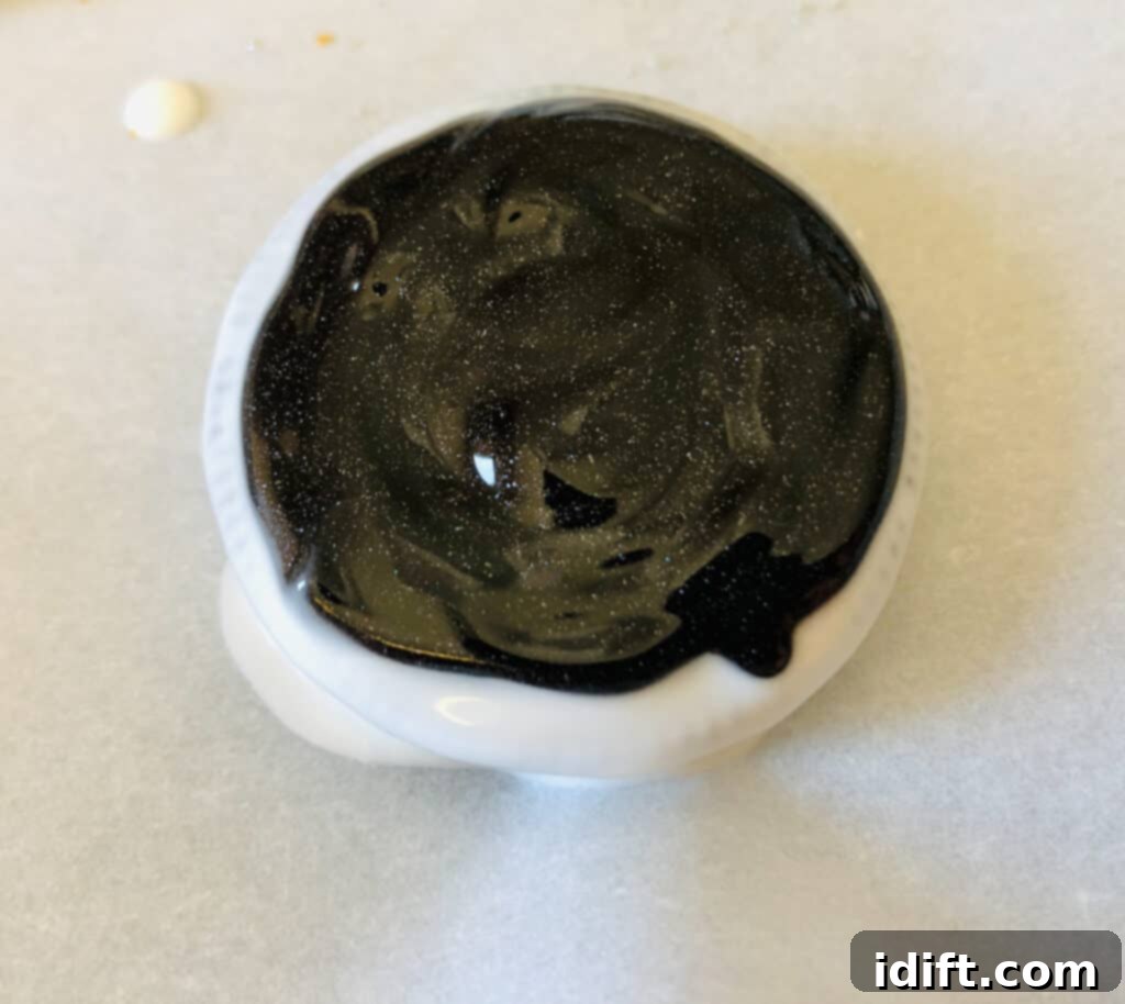 a cookie with black icing to change the clock face color