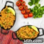 Hearty Vegan Mexican Grain Bowl 8 Vegan Mexican Cauliflower rice in two black oval serving dishes