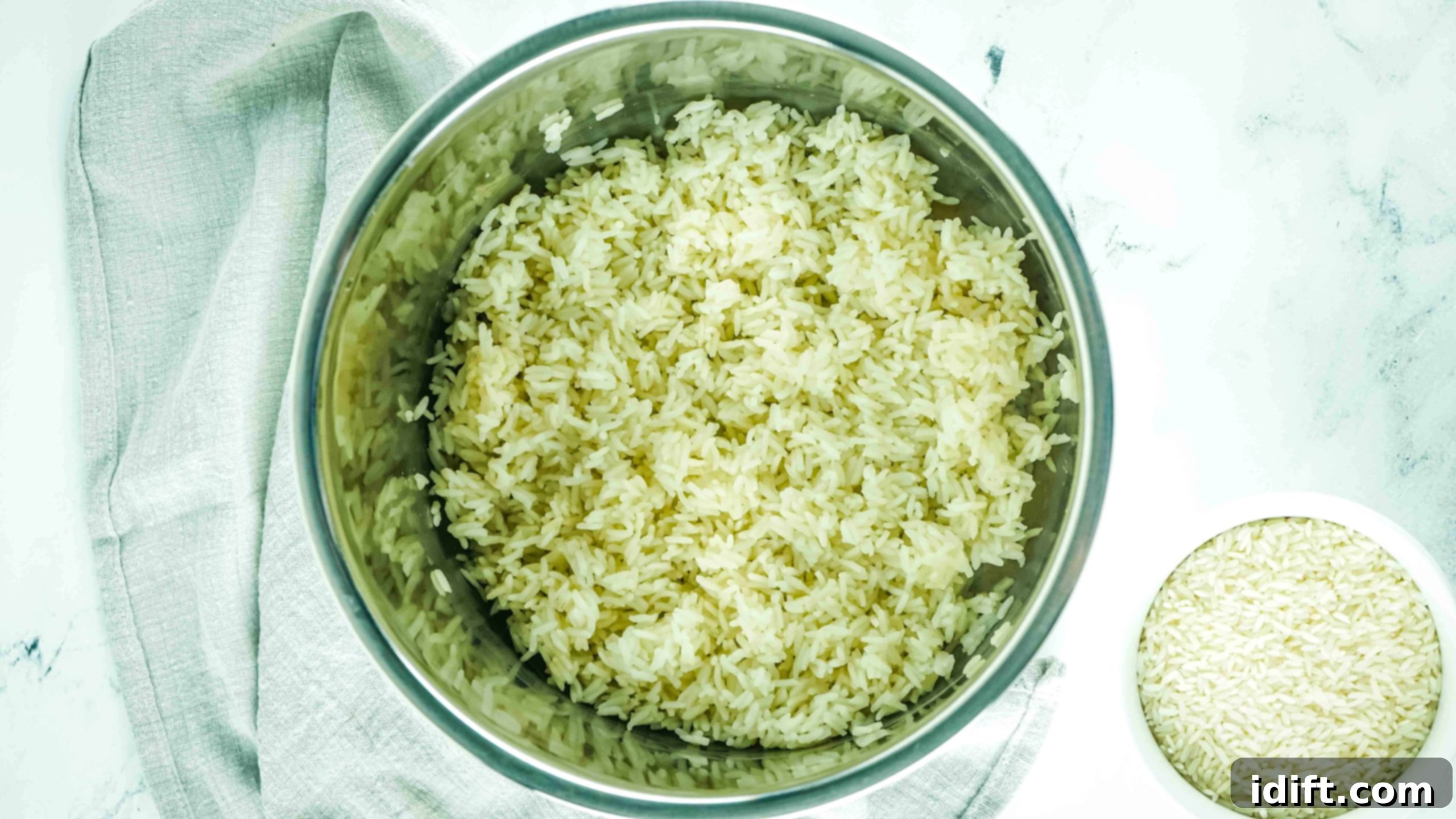 Foolproof Instant Pot Rice 8 Fluffy, cooked white rice inside the Instant Pot's inner insert after cooking and natural release.