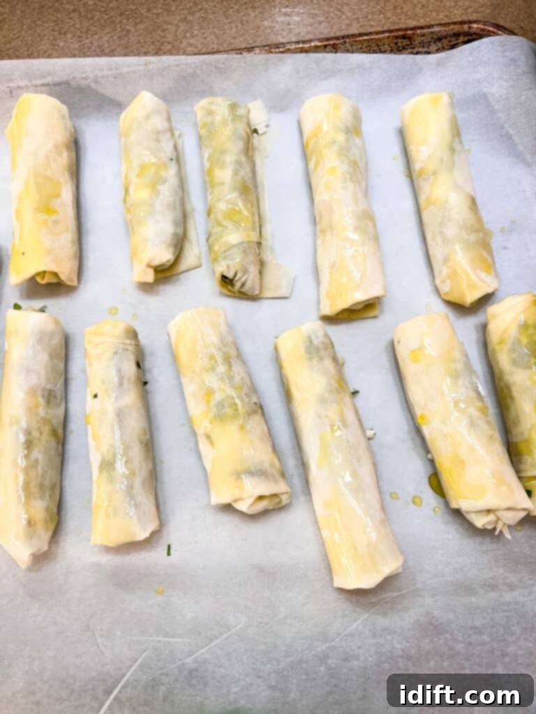 spanakopita rolls ready for the oven
