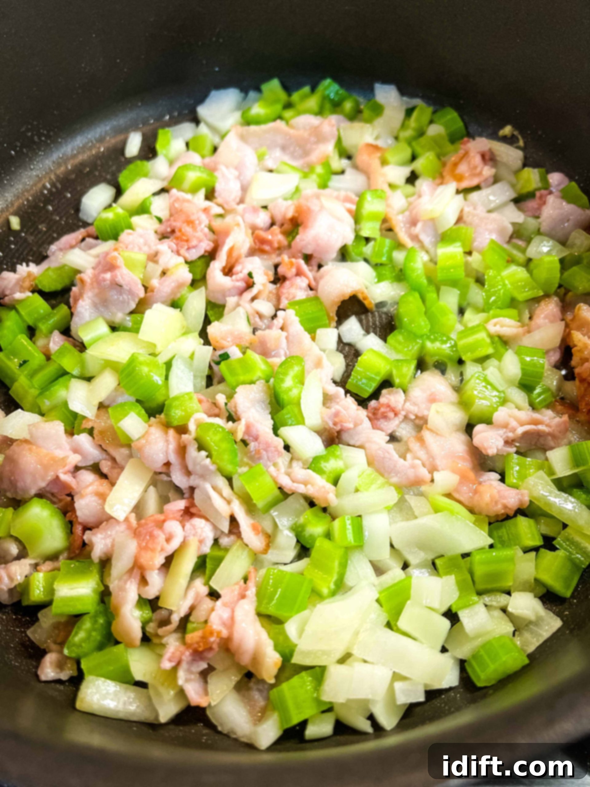 Sautee the onions, celery, bacon.