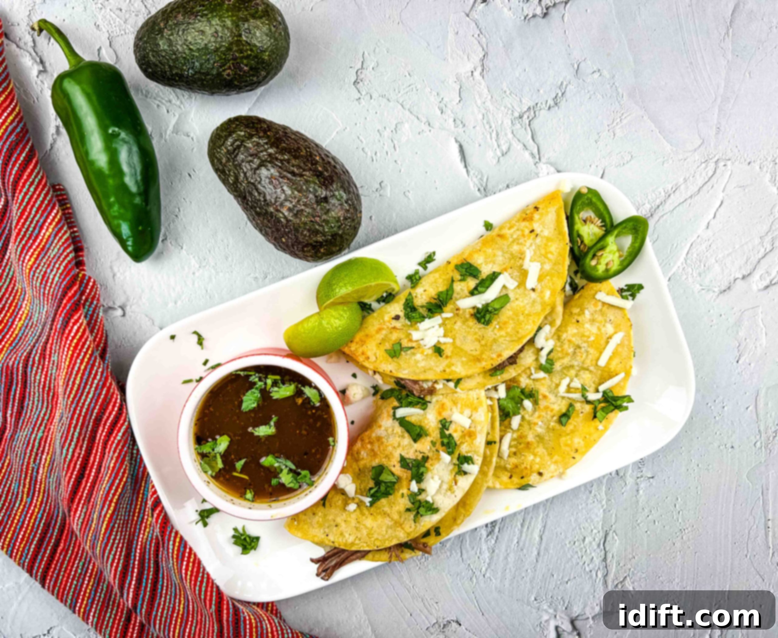 Serve and enjoy your birria tacos.