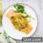 Cooked Seafood Stuffed Salmon on a plate.