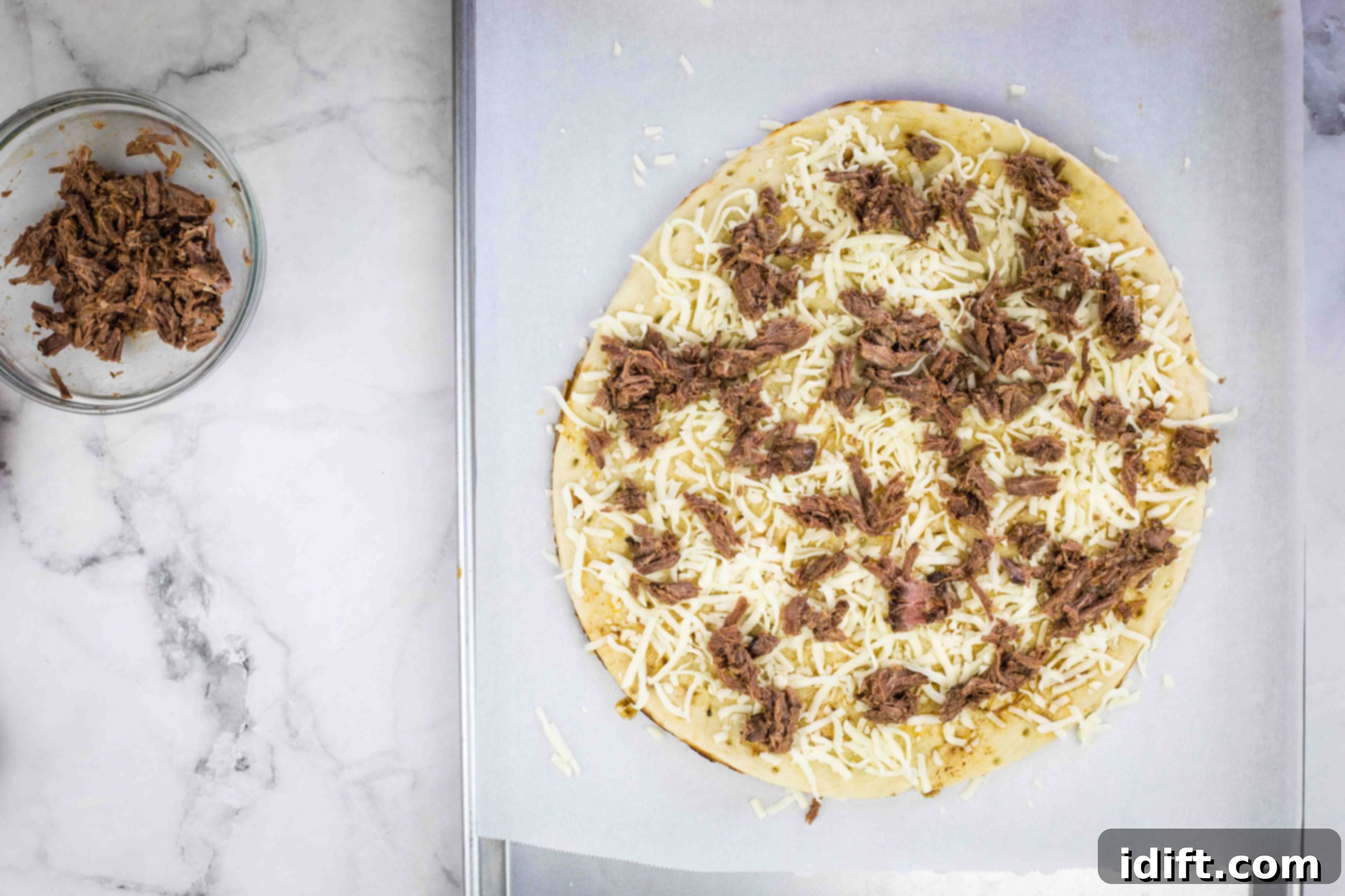 top with meat and cheese and bake