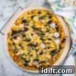 Birria Pizza on a pizza stone