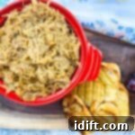 creamy caramelized onions on a platter with bread