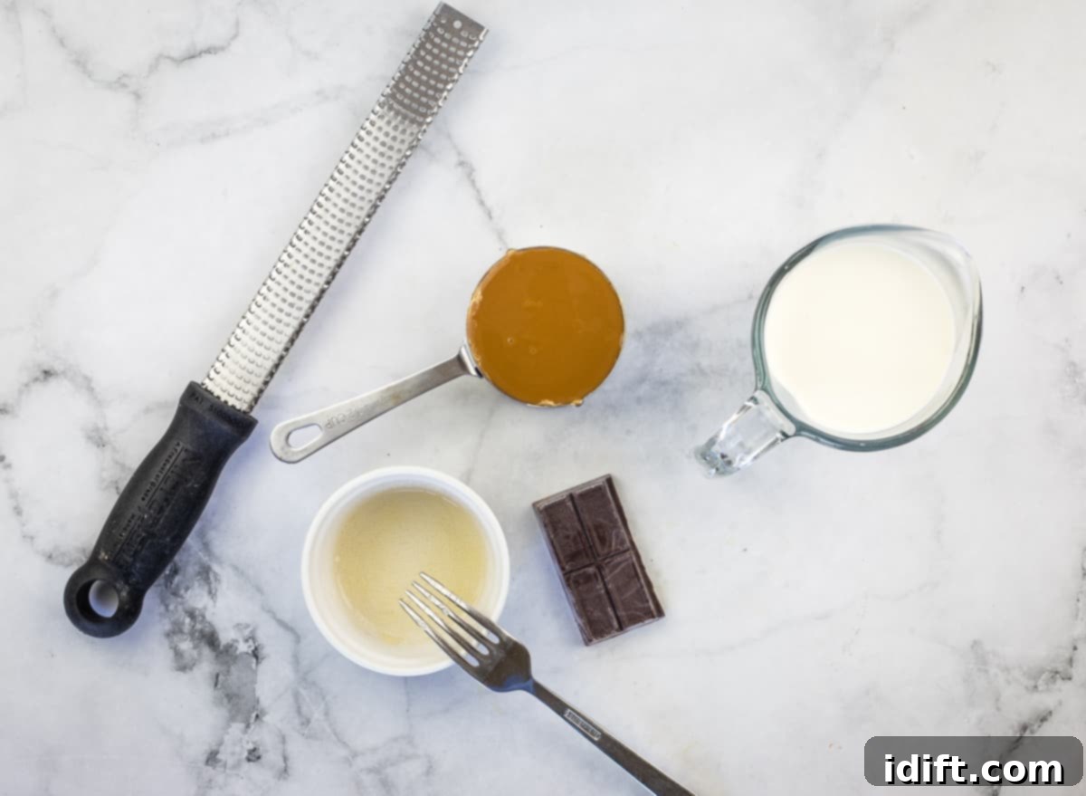 All the simple ingredients laid out for making Dulce de Leche Mousse, including heavy cream, dulce de leche, gelatin, and chocolate for garnish.