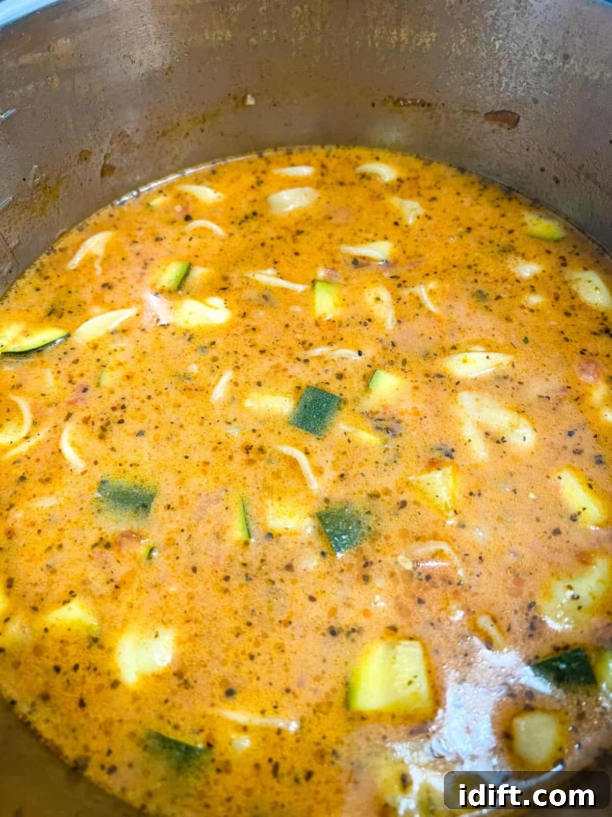 Creamy Instant Pot Sausage and Tomato Tortellini Soup 8 Cream added to the Instant Pot tortellini soup