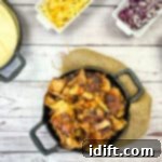 Ultimate Dutch Oven Pork Carnitas 13 Instant precision Dutch oven Carnitas on a cast iron skillet with Taco Fixings