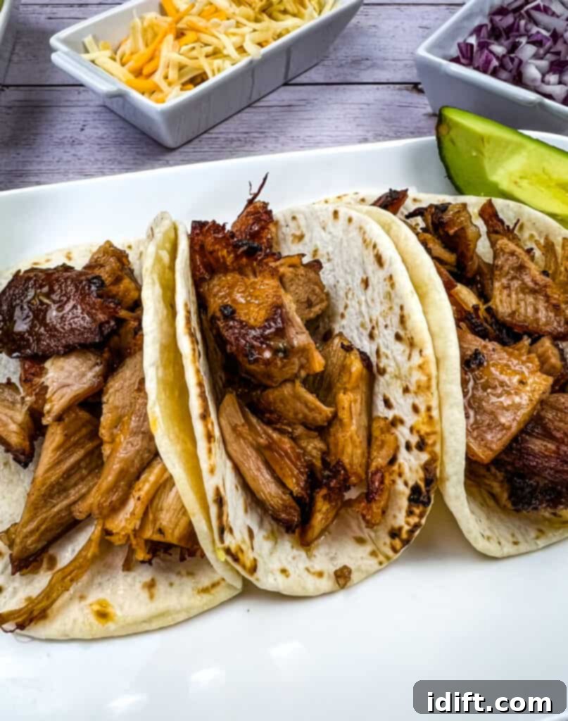 Ultimate Dutch Oven Pork Carnitas 4 dutch oven carnitas in tacos