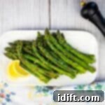 Perfectly Seared Blackstone Asparagus 4 A top-down view of perfectly griddled asparagus, ready to be served.