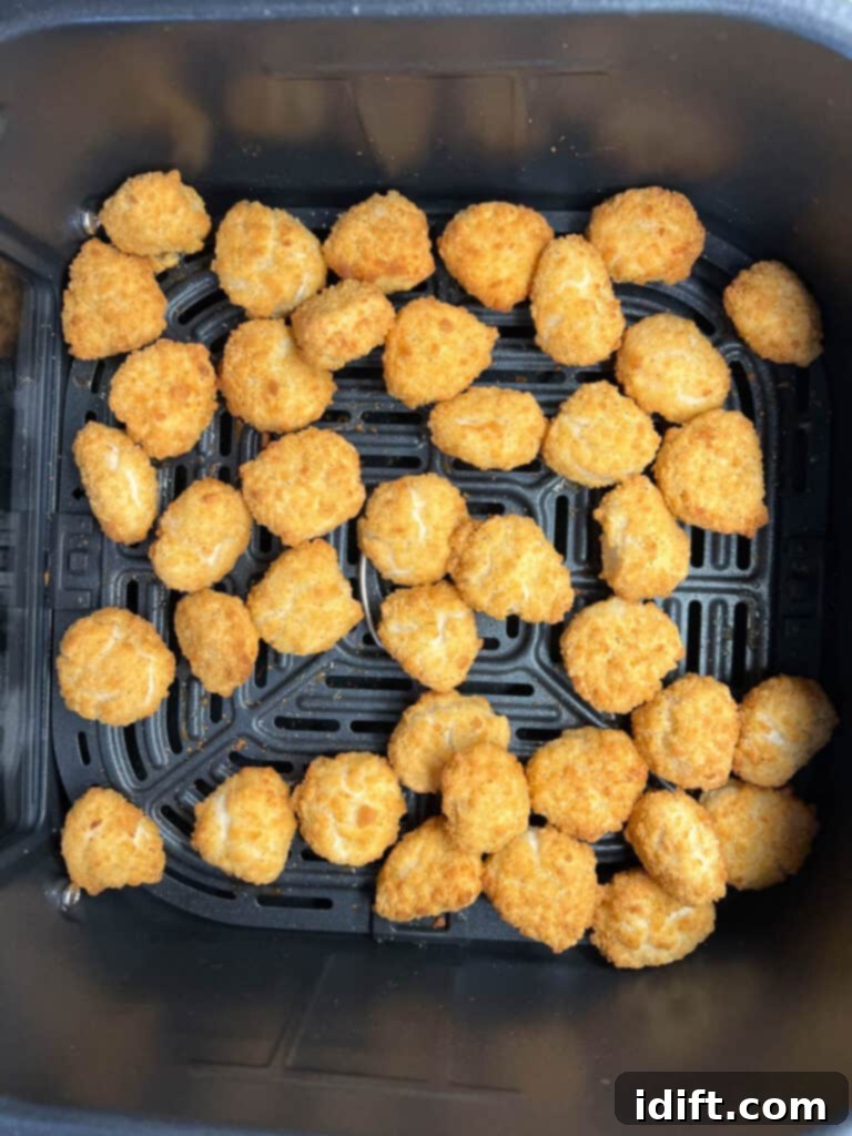 Crispy Air Fryer Popcorn Chicken 3 air fryer popcorn chicken in the air fryer basket