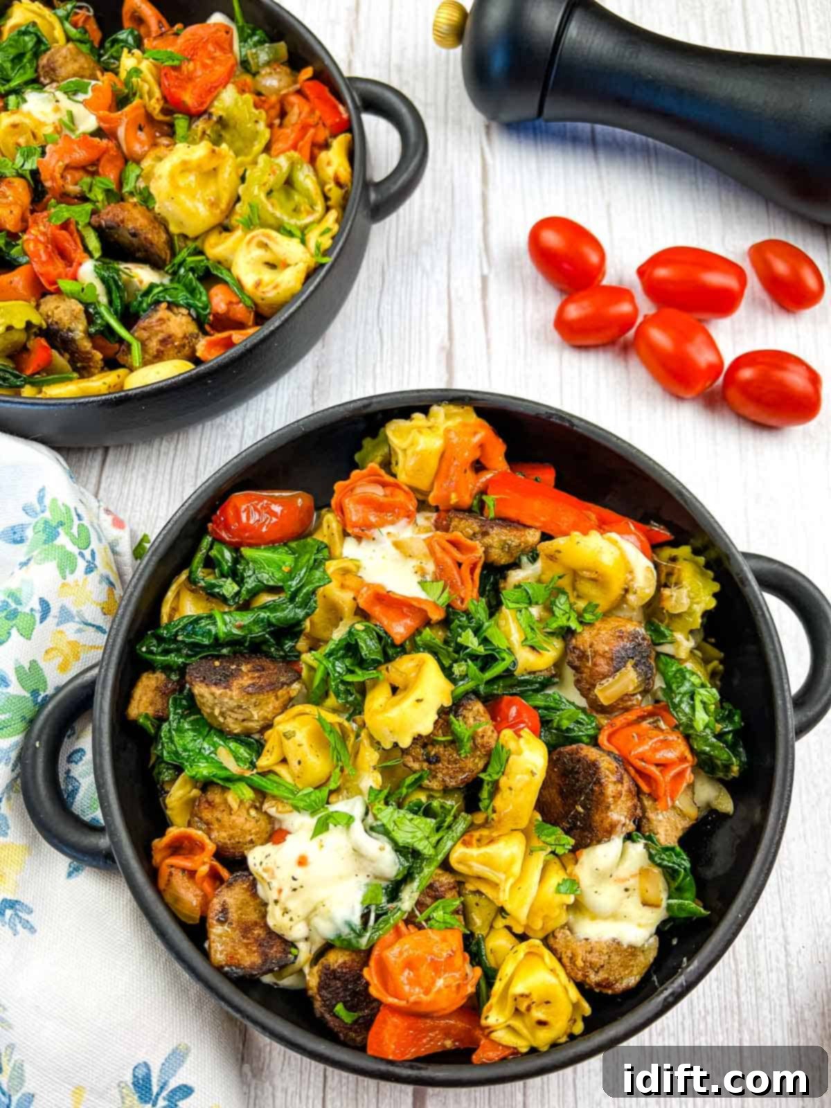blackstone tortellini with meatballs in two black bowls