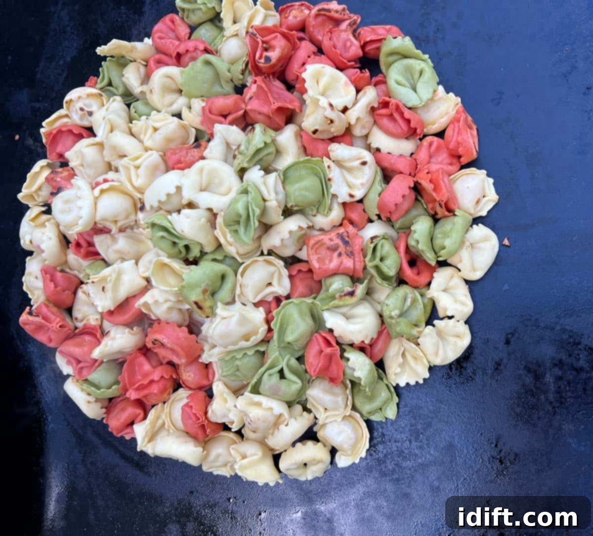 Tortellini cooking on the Blackstone griddle.