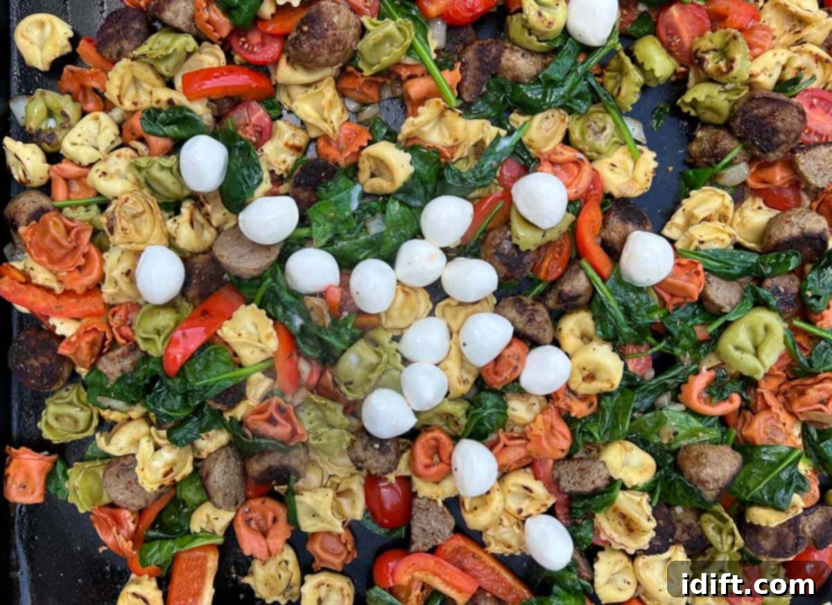 mozzarella cheese balls added to blackstone tortellini with meatballs.