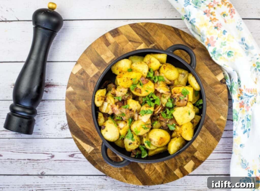blackstone potatoes in a black bowl on a cutting board