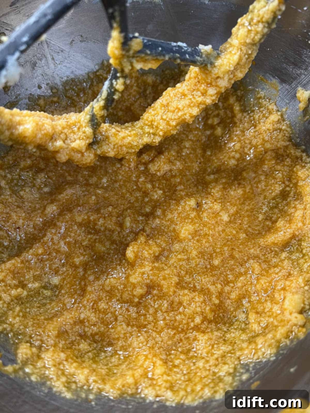 Mixing the wet ingredients thoroughly in a bowl.