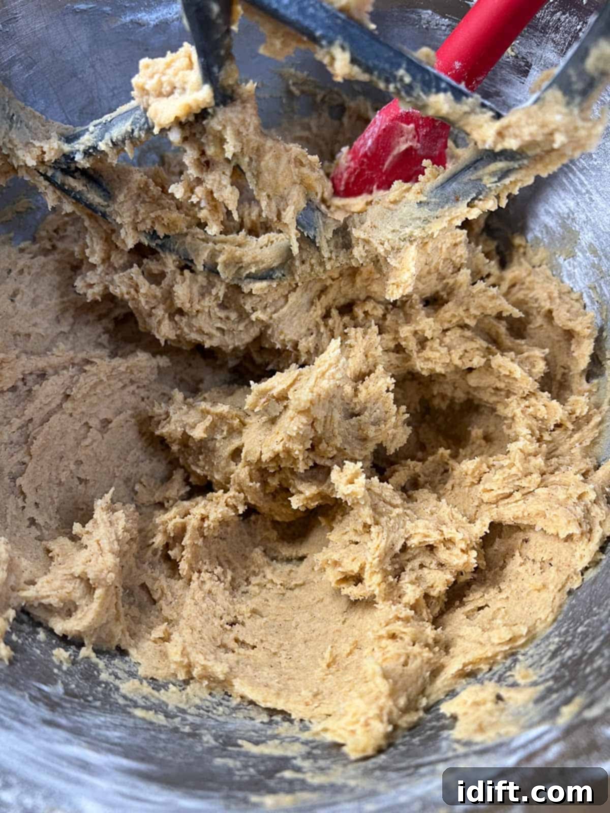 Pumpkin snickerdoodle cookie dough after the dry ingredients have been added.